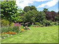 TQ2782 : The Holme, lawn and herbaceous borders by David Hawgood