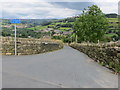 The wall enclosed Styes Lane near Sowerby at its junction with Pinfold Lane