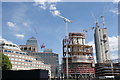 View of One Canada Square, the Citibank building and the Newfoundland construction site from the Thames Path