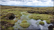 NH5981 : Area of bog on Cnoc Leathad na Siorramachd by Julian Paren