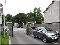 J5951 : Templecranny Graveyard from the drive of Ballyphilip CoI Parish Church by Eric Jones