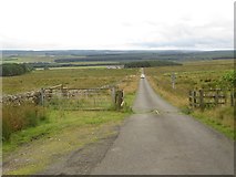 NY8182 : Cattle grid on the road north of West Highridge by Graham Robson