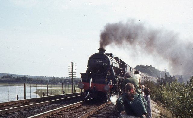 Steam train approaching the Kent Viaduct