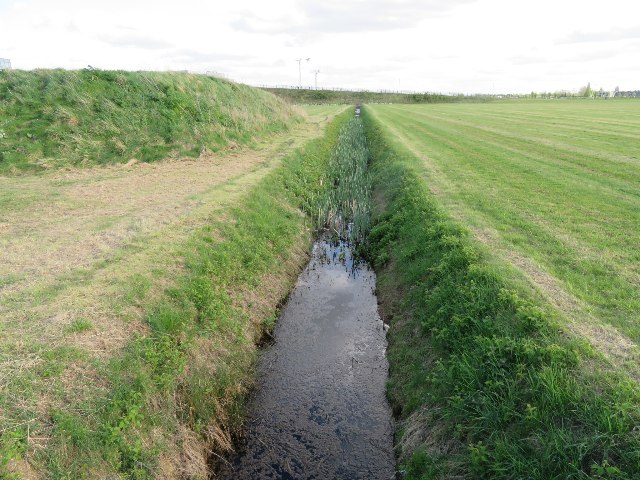 Drainage ditch by guided busway