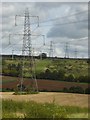 SP0415 : Electricity pylons above Cassey Compton by Philip Halling