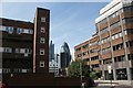 View of the Cheese Grater and Gherkin from Mansell Street