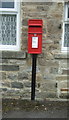 NY9538 : Elizabeth II postbox on the A689, Eastgate by JThomas