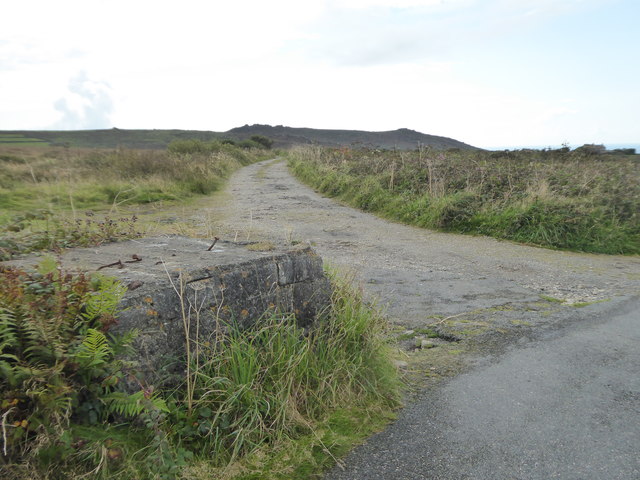 Milk churn stand beside the track leading to Bosporthennis