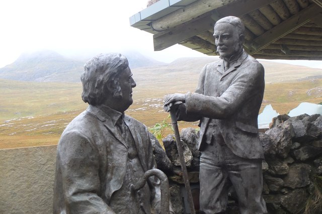 Two geologists, Knockan Crag information centre