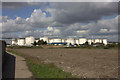 TQ5776 : Oil storage tanks by Robert Eva
