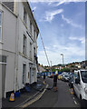 Hosing the gutters, Brunswick Street, Teignmouth