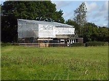 SO8742 : Earl's Croome Village Hall under scaffolding by Philip Halling
