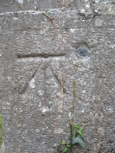 1GL benchmark and bolt on St Gwyndaf's Church, Dinas