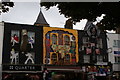 View of the shop fronts of Quarter, Nomaste and Dark Side on Camden High Street