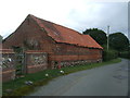 TG1114 : Old stone barn on Weston Green Road by JThomas