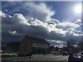 Lively clouds in view across Coten End, Warwick