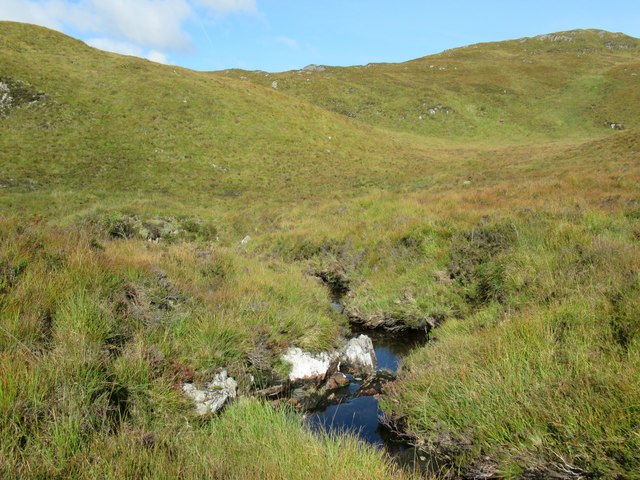 Burn negotiating peat bog before entering its gorge above Torr a' Bhreitheimh near Glen Moidart