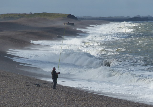 Angler on the beach at Weybourne Hope