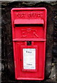 Queen Elizabeth II postbox in a Miskin Road wall, Trealaw