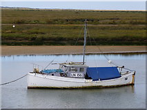 TF8444 : Fishing boat in Overy Creek near Burnham Overy Staithe by Richard Humphrey
