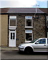 Memorial plaque on a Miskin Road house, Trealaw