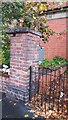 Benchmark on Brick Pillar in Trafalgar Road