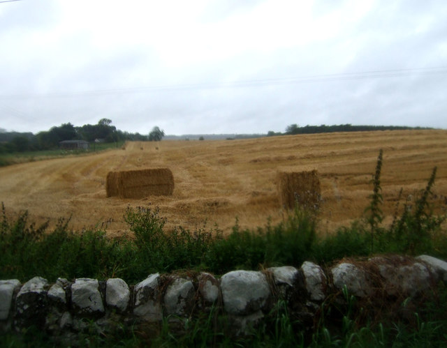 Stubble field with bales, Mersington