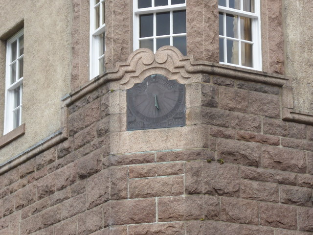 A wall-mounted sundial