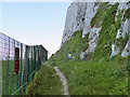 Public footpath at foot of cliffs