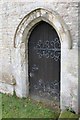 TF0246 : St Peter's church: The north door by Bob Harvey
