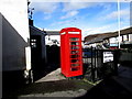 Red phonebox outside the Turberville Arms in Penygraig