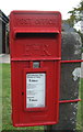 Close up, Elizabeth II postbox on The Street, Rockland St Mary