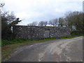 Old stone barn beside the road at Hele Cottage