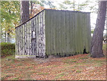 NJ6906 : Tool shed; in Midmar kirkyard by Stanley Howe
