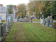 NJ6906 : Graves and Recumbent Stone, Midmar Kirk by Stanley Howe