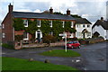 Houses by the green at Urchfont