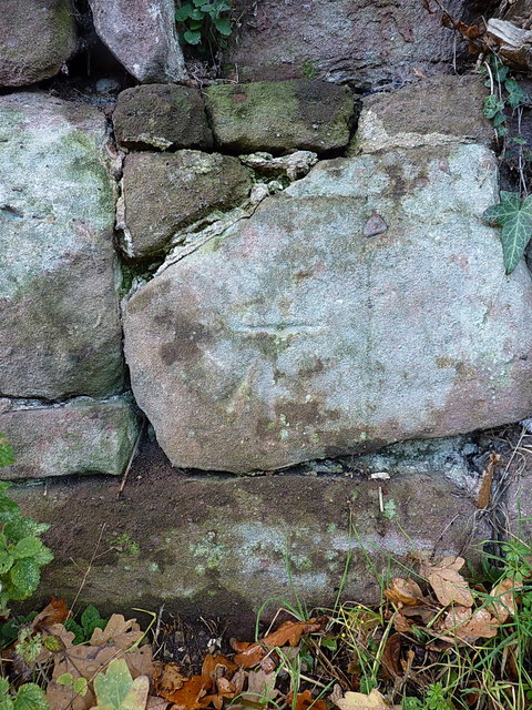 OS benchmark - Crudgington, wall of St Mary's graveyard
