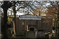 View of the side of Squires Almshouses from the path next to St. Mary