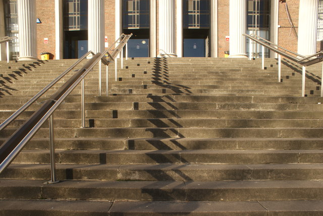 View of zigzag shadows of the handrails on the steps leading up into Waltham Forest College