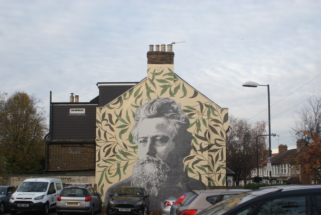 View of William Morris street art on the side of a house on Bedford Road from the Bedford Road car park