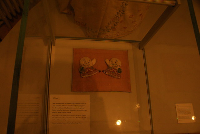 View of mittens designed by May Morris in the William Morris Gallery