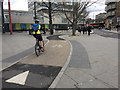 Cyclist negotiating the remodelled Elephant and Castle junction, south London