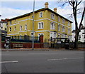 Yellow block of three-storey flats, Newport