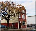 BT phonebox and a tree at the edge of White Hart House, Newport