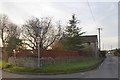 Fence and wall around a garden at Pedwell