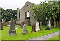 NX7869 : Gravestones at church in Kirkpatrick Durham by Trevor Littlewood
