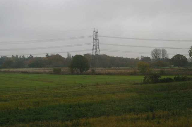 Low-lying fields by the railway line