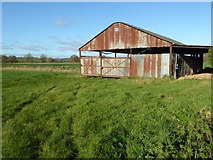 SO5060 : Shed in the corner of a field by Philip Halling