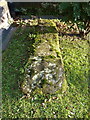 Medieval gravestone outside the porch of St Mary