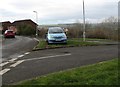 SS8987 : Car on  a grass triangle in Bettws by Jaggery
